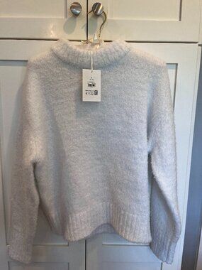 White sweater with silver specks